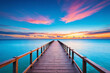 Sunset on a wooden pier and a luxury resort on the Maldives island. Magnificent beach, sky and clouds as a background for a summer trip and travel.