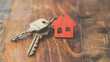 House keys with house shaped keychain cut out