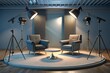 © MdNazim - Stylish Studio Set-Up with Chairs, Cameras, Lights, and Microphones, Awaiting Interviews.