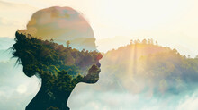 Double Exposure Of Nature Landscape Mountain Forest And Woman Face. A Person's Face Is Shown In A Forest With Trees And Clouds In The Background. Concept Of Serenity And Tranquility.