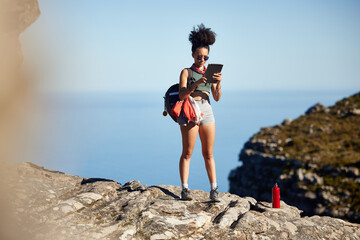 Wall Mural - mountain, hiking and backpack of woman with tablet for travel guide, networking or fitness blog upda