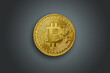 Real bitcoin coin on dark background