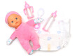 Baby doll, diapers, pacifier and bottles for feeding a baby on a white background. Taking care of the child.