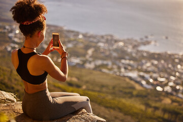 Sticker - Photography, peace or woman with smartphone on mountain for yoga, train or exercise for wellness, sport or in back view. Workout, zen or person by nature, environment or outdoor for fitness or vision