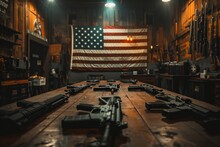 Multiple Guns Laid Out On A Wooden Surface In A Rustic Room, With An American Flag Displayed Prominently In The Background.