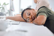 Black woman, sleep and tired in office on table with glasses, exhausted and overtime or deadline. Female employee, business and fatigue from administration work with nap, burnout and overwork