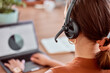 © peopleimages.com - Woman, callcenter and headphone with mic for support, voter registration help desk and agent with pole numbers on laptop screen. Back of phone call, contact center and data with election information