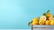 Lemons on wooden table with light blue background. Summer holiday banner with fresh citrus fruits in a wooden box, summer accessories and lemons on a blue background with copy space