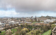 View of Edinburgh Skyline including Carlton Hill, the St James Quarter building, with rain clouds over the Firth of Forth in the distance