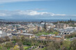 View of Edinburgh Skyline including Carlton Hill, the St James Quarter building, with rain clouds over the Firth of Forth in the distance, Edinburgh,
