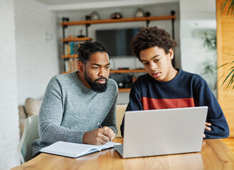 father child home family homework son  teenage parent education laptop teen boy teaching childhood man  learning together school computer internet teacher tutor black