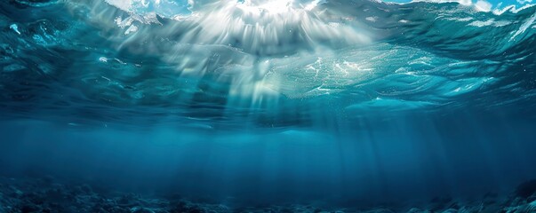 Poster - underwater picture of the ocean's surface illuminated by sunlight, forming an undersea landscape