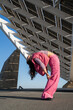 © Alba Vitta/Stocksy - Flexible woman dancing and posing outdoros