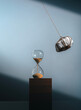 © Tatyana Lavrova/Stocksy - Abstract composition with stone and sandglass. A moment before...