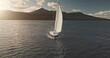 Sun seascape with white sails yacht in open sea aerial. Sailing on sailboats at ocean bay. Luxury yachting lifestyle at summer sunny day. Cinematic serene, calm and relax concept
