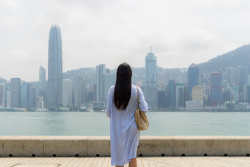 Wall Mural - Woman visit Hong Kong city