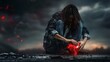 © JovialFox - Anti-Valentine's day idea. Sad man holding a broken heart in her hands after a breakup relationship or divorce from her partner. Gloomy background.