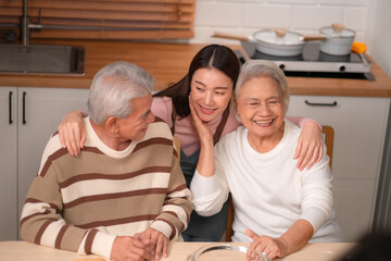 Wall Mural - Asian Family Happiness in the Kitchen: Senior Parents Cooking Dinner with Joy, Children Laughing, A Fun and Loving Atmosphere of Togetherness, Creating Delicious Meals and Beautiful Memories