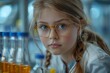 Young girl posing as an aspiring scientist with round yellow glasses and laboratory flasks behind her