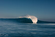 © Adrian Rodd/Stocksy - A huge wave breaking over itself in the middle of the Atlantic Ocean