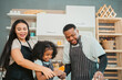© chokniti - In a home kitchen, black father and his daughter bond over cooking a meal food, their laughter and love filling the air, embodying the joy of African American family life, Father's Day concept