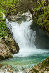 Soča, Bovec, Slovenia. Valley with rapid rivers surrounded by woods. Tibetan wooden bridges. Area for sporting activities such as rafting. Walking and trekking. Amazing turquoise and emerald water.