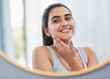 © peopleimages.com - Beauty, skincare and reflection of woman in mirror of bathroom for cosmetics, skincare or vitamin c. Face, collagen and dermatology with happy person in apartment for antiaging wellness routine