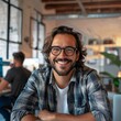 © liudmila - Smiling Entrepreneur in Casual Office