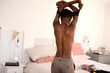 © Guille Faingold/Stocksy - Undressing