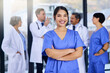 © peopleimages.com - Team, hospital and portrait of nurse with crossed arms for medical service, insurance or collaboration. Professional, healthcare student and woman in clinic for wellness, medicare and consulting