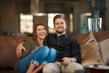 Poster - Happy couple, smile and hug on sofa for movie, care or in love for relationship and dating on weekend in home. Man, woman and cheerful in house for bond, affection or loving for watching tv or unwind