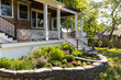 © Raymond Forbes LLC/Stocksy - Backyard Porch summer