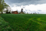 Fototapeta Paryż - Old grain grinding windmill in Palczewo