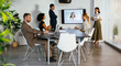 © BONNINSTUDIO/Stocksy - Financial managers having a meeting in conference room