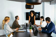 © BONNINSTUDIO/Stocksy - Financial advisors having a meeting in office