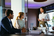 © BONNINSTUDIO/Stocksy - Financial advisors having a meeting in office