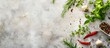© Lasvu - Herbs and spices on a light stone background, seen from above with extra space for text.