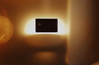 © Tani Nekrasova/Stocksy - A credit card in a golden light, still life