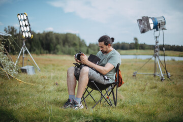 Wall Mural - The focusing device turns focus on the set. The fokuspuler checks the sharpness of the frame of the playback during the filming of a movie