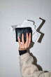 © Synchro Shoot/Stocksy - Thick wallet with receipts