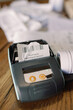 © Oleksii Syrotkin/Stocksy - Close-Up of a Point of Sale Receipt Printer