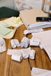 © Oleksii Syrotkin/Stocksy - Table clutter with bills and paperworks