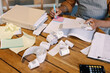 © Oleksii Syrotkin/Stocksy - Anonym engaging in financial review