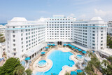 Fototapeta  - luxury vacation resort hotel with blue water pools
