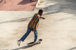 © Lucas Ottone/Stocksy - Active black man skateboarding