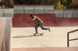 © Lucas Ottone/Stocksy - Active black man skateboarding