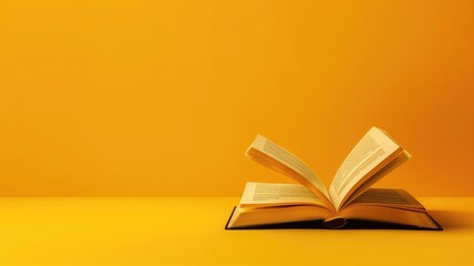 Open book on yellow background with vibrant color contrast, symbolizing reading, learning, and education