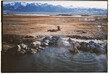 © Christine La/Stocksy - Film Photo: Woman enjoying hot spring
