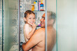 © Carlos Gonzales/Stocksy - Happy Father and Son in the Shower
