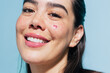 © Ángela Rober/Stocksy - Portrait of a woman with a heart on her cheek